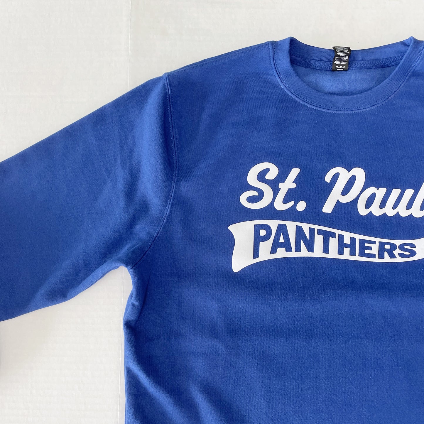 Saint Paul Panthers: Soft Flock Varsity Crewneck