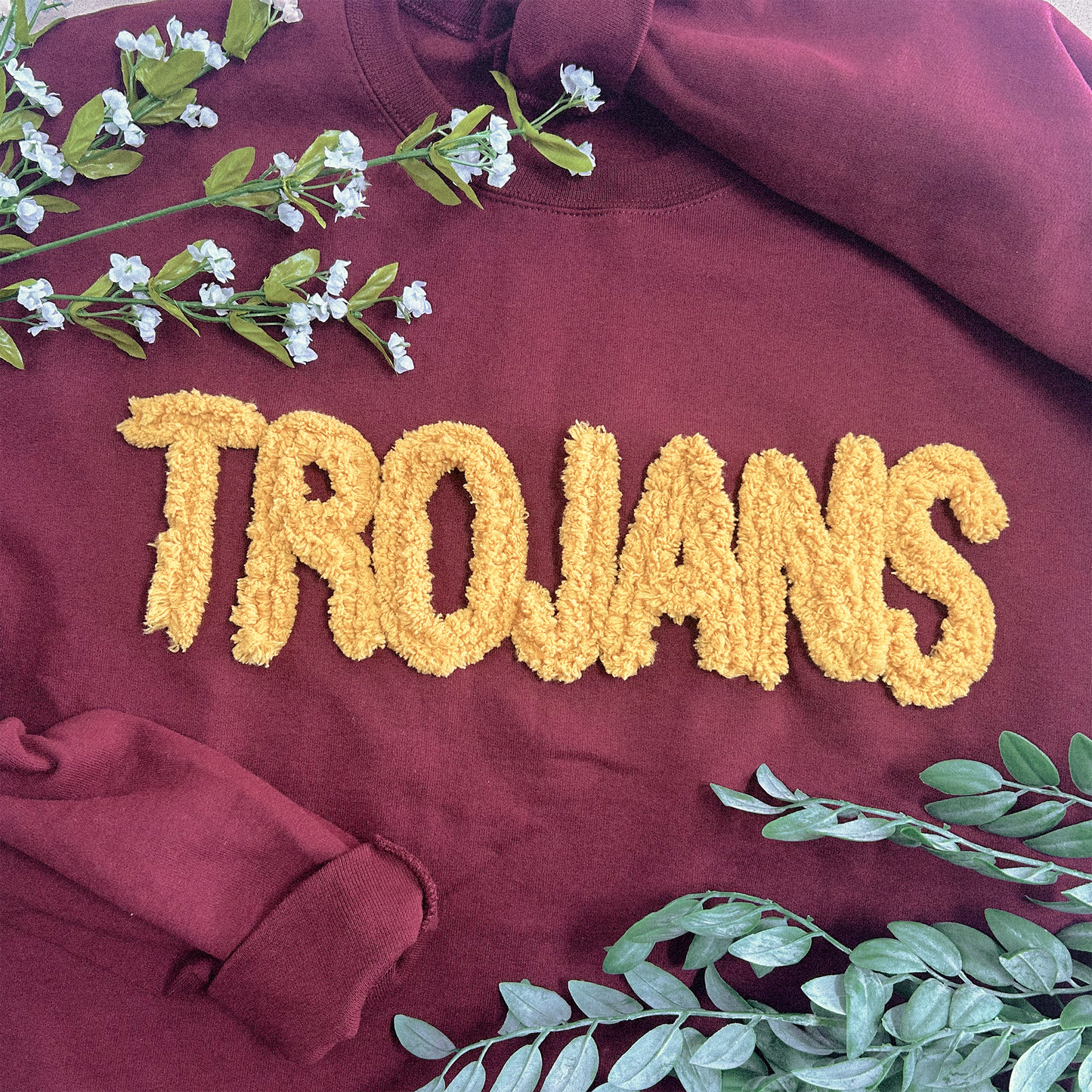 maroon red crewneck sweatshirt with gold trojans embroidered yard chenille